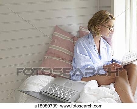 Businesswoman working from home View Large Photo Image Stock Photo - Businesswoman working from home. Fotosearch