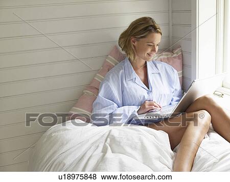 Businesswoman working from home View Large Photo Image Stock Photo - Businesswoman working from home. Fotosearch