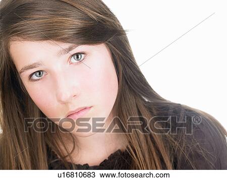 Stock Image - Girl looking at camera, seriously. Fotosearch