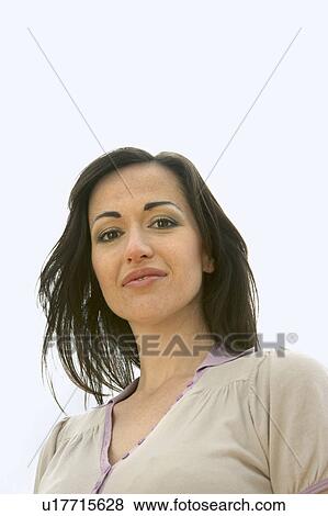 Woman with windswept hair, close-up, portrait. Alicante, Spain. View Large Photo Image Stock Photo - Woman with windswept hair, close-up, portrait. Alicante, Spain.. Fotosearch