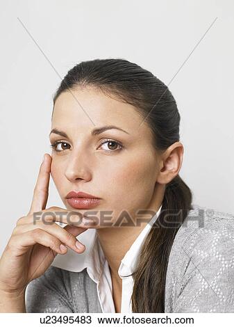 Businesswoman at her desk View Large Photo Image Stock Image - Businesswoman at her desk. Fotosearch