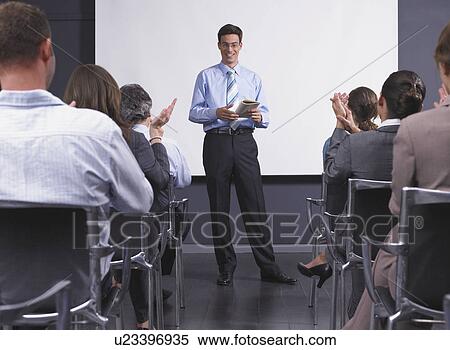 Man giving speech in presentation room View Large Photo Image Stock Photography - Man giving speech in presentation room. Fotosearch