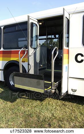 Image of a lift on an accessible bus that will lift a wheel chair onto the bus. View Large Photo Image Stock Photo - Image of a lift on an accessible bus that will lift a wheel chair onto the bus.. Fotosearch