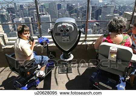 Mother and two boys viewing the sights of New York City. View Large Photo Image Stock Photography - Mother and two boys viewing the sights of New York City.. Fotosearch
