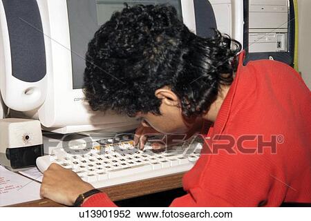 Woman with disabilities, including a visual impairment, typing an e-mail to a friend on her computer. View Large Photo Image Stock Image - Woman with disabilities, including a visual impairment, typing an e-mail to a friend on her computer.. Fotosearch