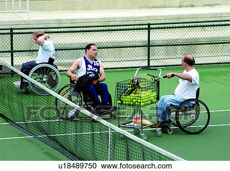People with disabilities, all who utilize wheelchairs for mobility, learning to play tennis from an instructor at their local recreation center. View Large Photo Image Stock Image - People with disabilities, all who utilize wheelchairs for mobility, learning to play tennis from an instructor at their local recreation center.. Fotosearch