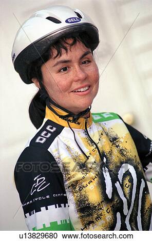 Young woman with a disability preparing to embark on a bicycle ride. View Large Photo Image Stock Image - Young woman with a disability preparing to embark on a bicycle ride.. Fotosearch