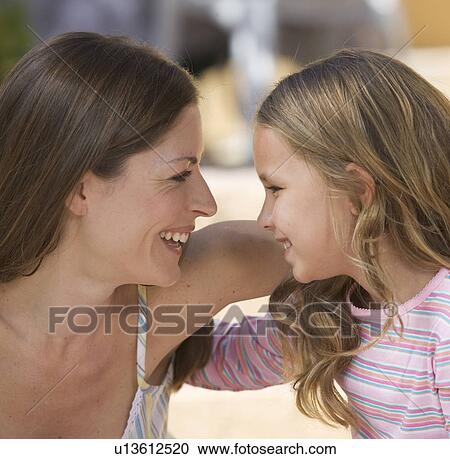 Portrait of a mother and her young daughter, close-up View Large Photo Image Stock Image - Portrait of a mother and her young daughter, close-up. Fotosearch
