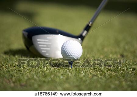 Close-up of a golf club and ball on a tee View Large Photo Image Stock Photo - Close-up of a golf club and ball on a tee. Fotosearch
