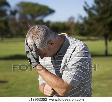 Despair on the golf course View Large Photo Image Stock Image - Despair on the golf course. Fotosearch