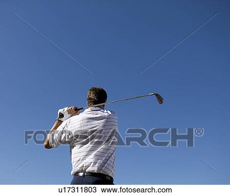 Man playing golf View Large Photo Image Stock Image - Man playing golf. Fotosearch