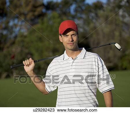 Man playing golf View Large Photo Image Stock Image - Man playing golf. Fotosearch