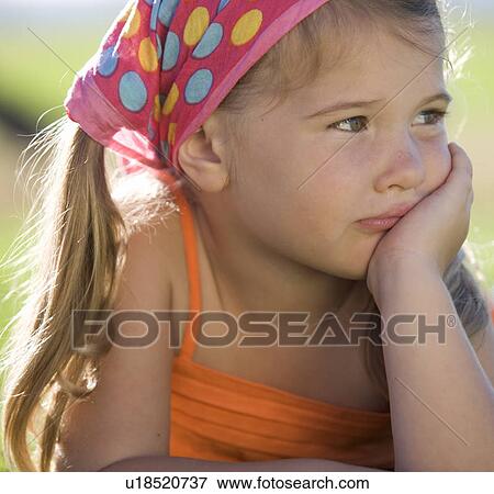 Stock Photo - Portrait of a young girl, close-up. Fotosearch