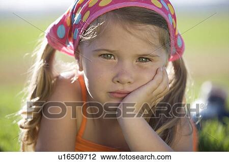 Portrait of a young girl View Large Photo Image Stock Image - Portrait of a young girl. Fotosearch