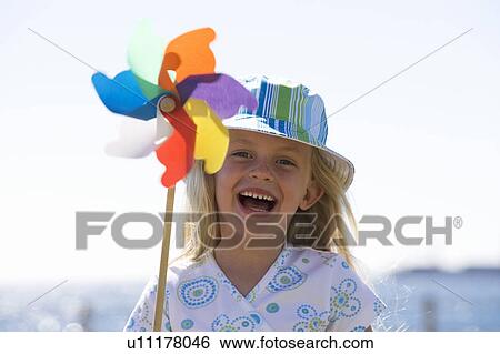 Stock Photograph - Portrait of a young girl. Fotosearch