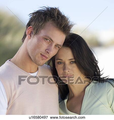 Stock Photo - Portrait of a young couple. Fotosearch