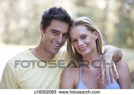 Stock Image - Portrait of a young couple. Fotosearch