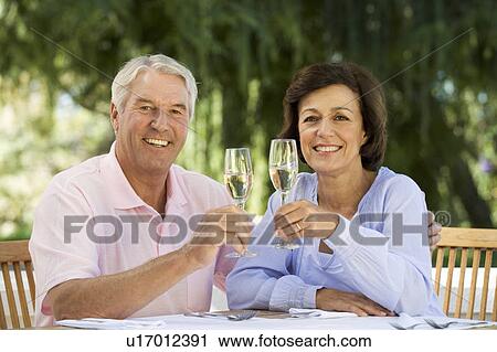 A senior couple celebrating View Large Photo Image Stock Image - A senior couple celebrating. Fotosearch