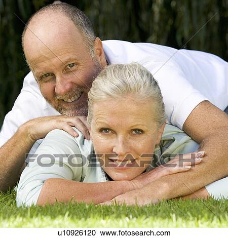 A senior couple in a garden View Large Photo Image Stock Image - A senior couple in a garden. Fotosearch
