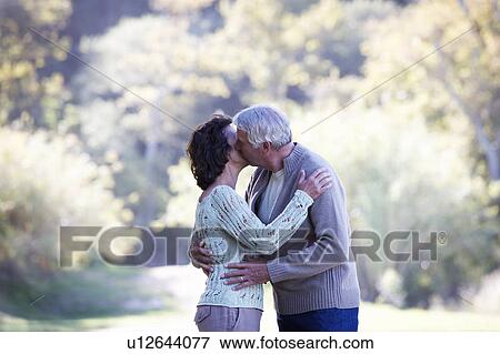 A senior couple kissing View Large Photo Image Stock Photo - A senior couple kissing. Fotosearch
