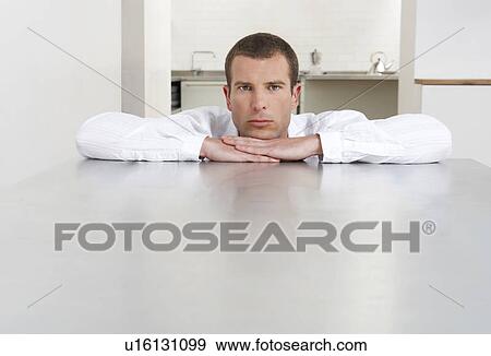 Young man at home View Large Photo Image Stock Photo - Young man at home. Fotosearch