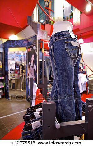 Different kinds of clothes showing in the store, Clothing Store View Large Photo Image Stock Photograph - Different kinds of clothes showing in the store, Clothing Store. Fotosearch