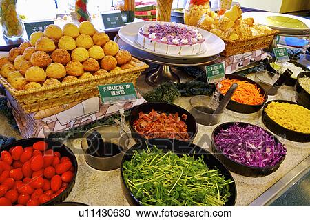 Stock Image - Different kinds of food serving in the restaurant, Restaurant. Fotosearch