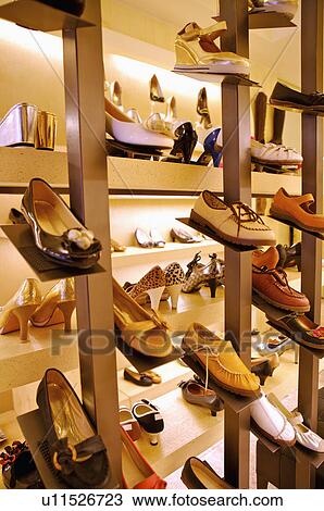 Different kinds of shoes showing on the shelf in the store, Shoe StoreShoe Store View Large Photo Image Stock Image - Different kinds of shoes showing on the shelf in the store, Shoe StoreShoe Store. Fotosearch