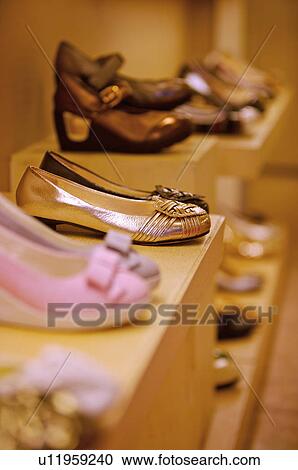 Different kinds of shoes showing on the shelf in the store, Shoe StoreShoe Store View Large Photo Image Stock Image - Different kinds of shoes showing on the shelf in the store, Shoe StoreShoe Store. Fotosearch
