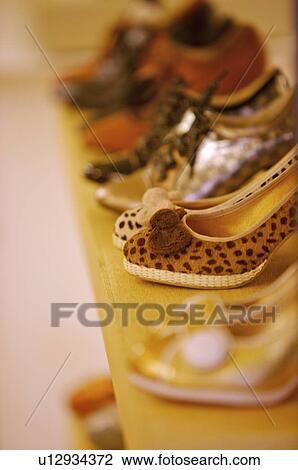 Different kinds of shoes showing on the shelf in the store, Shoe StoreShoe Store View Large Photo Image Stock Image - Different kinds of shoes showing on the shelf in the store, Shoe StoreShoe Store. Fotosearch