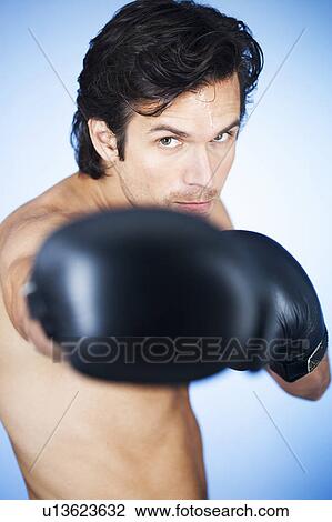 A young man boxing View Large Photo Image Stock Image - A young man boxing. Fotosearch