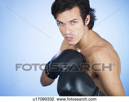 A young man boxing View Large Photo Image Stock Image - A young man boxing. Fotosearch