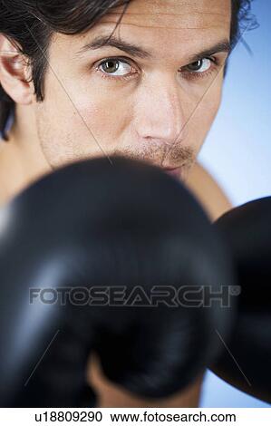A young man boxing View Large Photo Image Stock Image - A young man boxing. Fotosearch