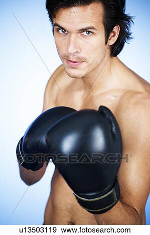 A young man boxing View Large Photo Image Stock Photo - A young man boxing. Fotosearch