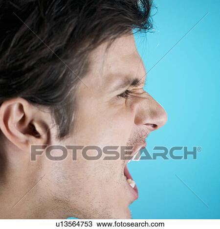 Stock Image - A young man shouting. Fotosearch