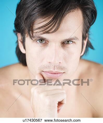 Portrait of a young man View Large Photo Image Stock Photo - Portrait of a young man. Fotosearch