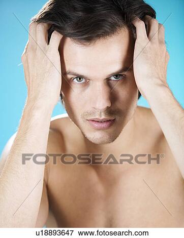 Stock Photo - Portrait of a young man. Fotosearch