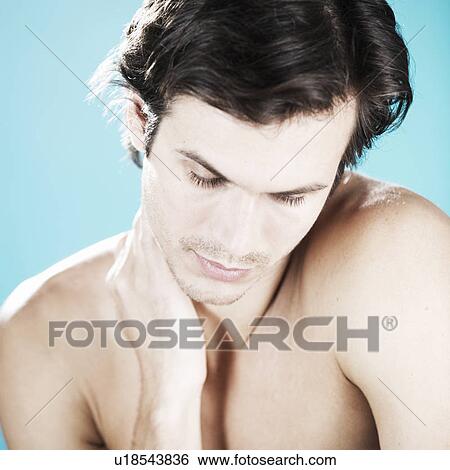 Portrait of a young man View Large Photo Image Stock Photograph - Portrait of a young man. Fotosearch