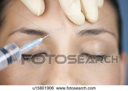 A young woman having botox injections View Large Photo Image Stock Photograph - A young woman having botox injections. Fotosearch