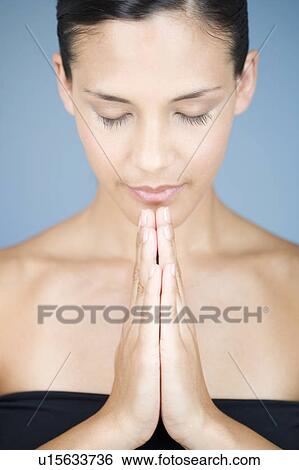 Stock Photograph - Portrait of a young woman. Fotosearch