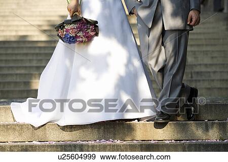 Stock Photo - A bride and groom. Fotosearch