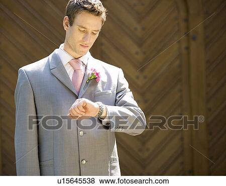 Stock Photo - A groom waiting for the bride. Fotosearch