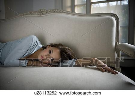 A young woman wearing silk pyjamas View Large Photo Image Stock Image - A young woman wearing silk pyjamas. Fotosearch