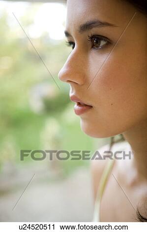 Stock Image - Portrait of a young woman. Fotosearch
