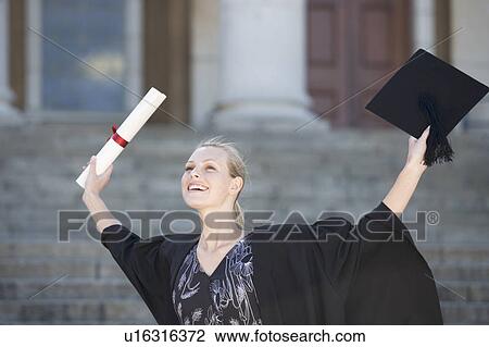 Stock Image - A graduate celebrating. Fotosearch