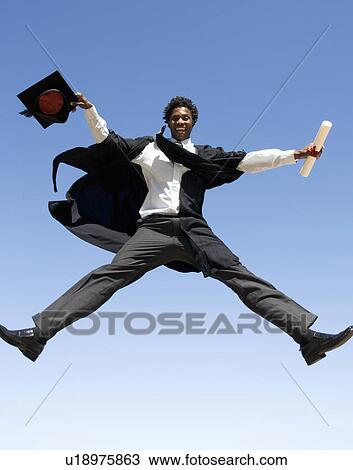 A graduate jumping for joy View Large Photo Image Stock Image - A graduate jumping for joy. Fotosearch