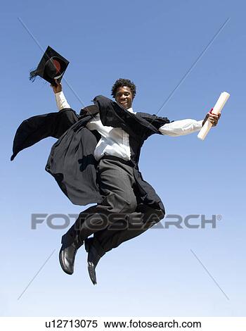 A graduate jumping for joy View Large Photo Image Stock Photography - A graduate jumping for joy. Fotosearch