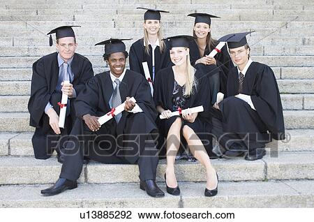 A group of graduates celebrating View Large Photo Image Stock Image - A group of graduates celebrating. Fotosearch