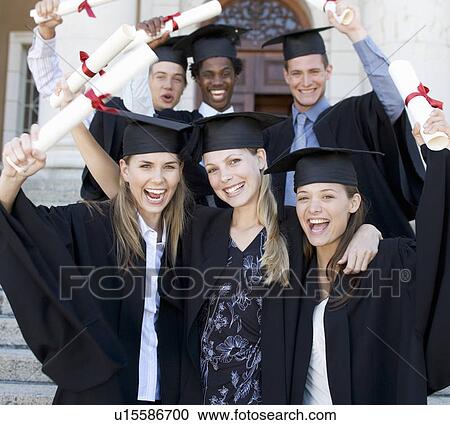 A group of graduates celebrating View Large Photo Image Stock Image - A group of graduates celebrating. Fotosearch