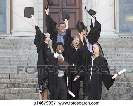 A group of graduates celebrating View Large Photo Image Stock Photo - A group of graduates celebrating. Fotosearch